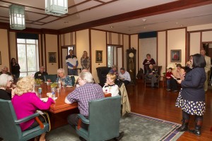Georgette Vigil, Director of Alumni Relations, Welcoming the Golden Graduates in the Presidents' Room. Photo courtesy of David Slipher, Alumni Relations.