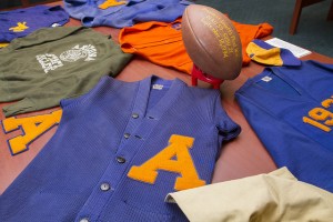 Letter Sweaters, Chain Gang Sweater, and Commemorative Football. Photo courtesy of David Slipher, Alumni Relations.
