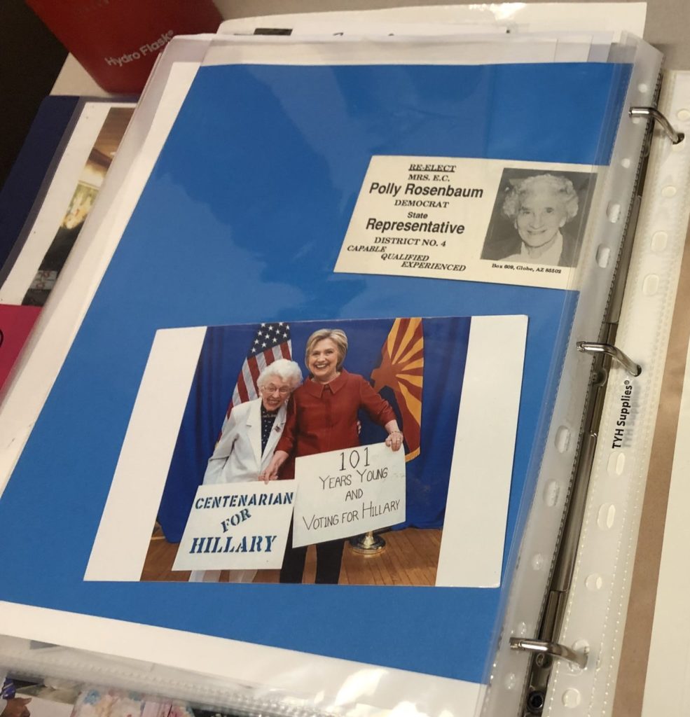 A page from one of Jerry Emmetts binders showing Emmett with presidential nominee Hillary Clinton