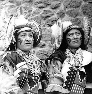 Image of Pow Wow, July 10, 1947. [Two Native American women wearing headdresses.] 