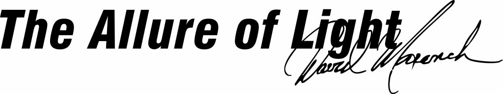 physical exhibit title graphic "The Allure of Light" with Muench's signature at the bottom